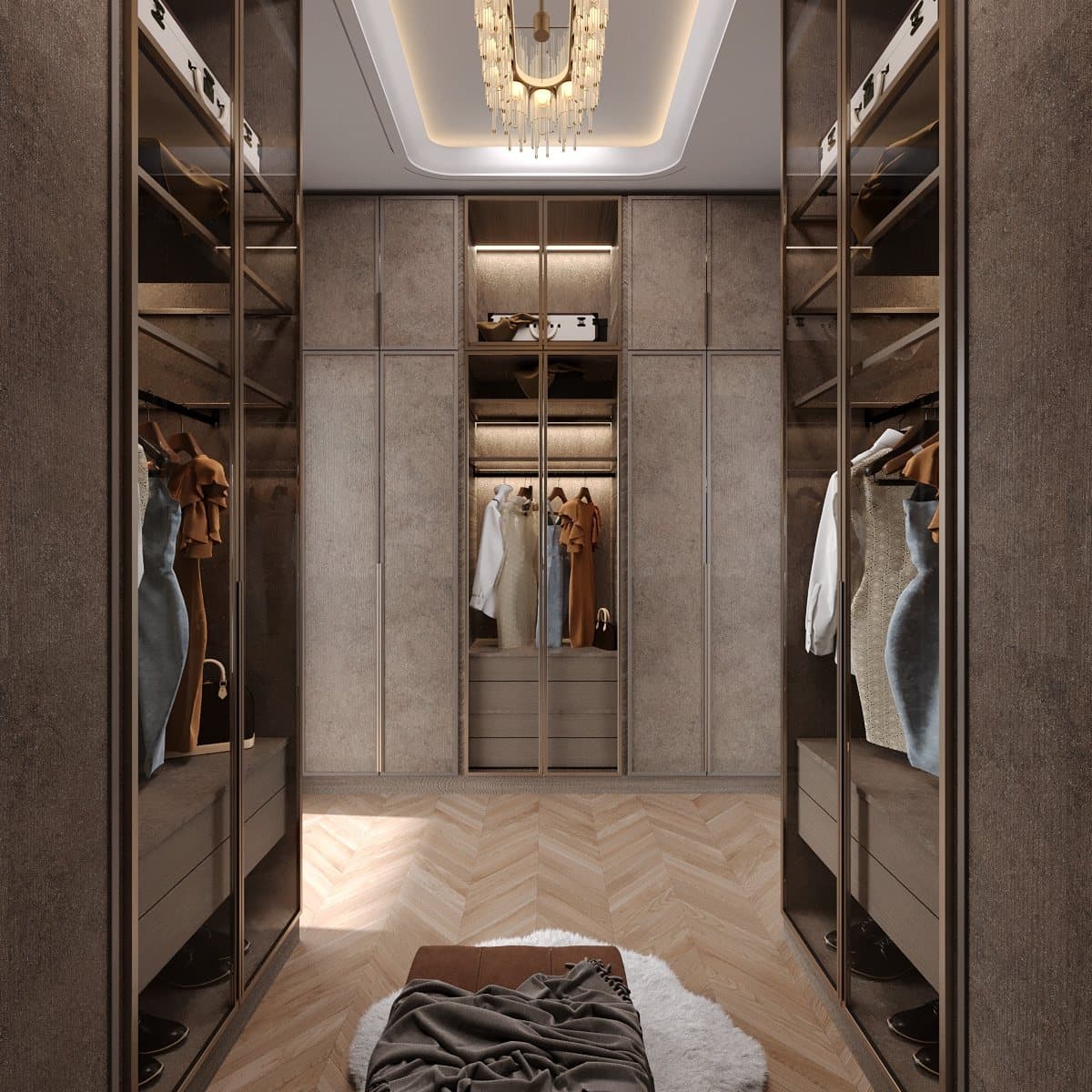 Glass and gold walk-in wardrobe by Amaza Homes in Clifton